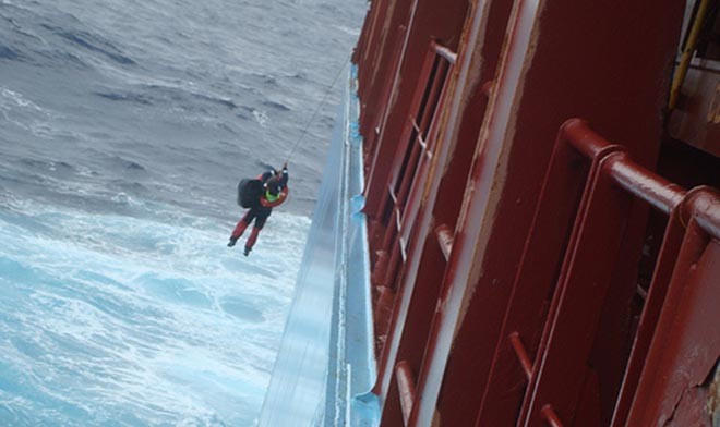 AMVER ship lifts rescued sailor aboard ©  SW